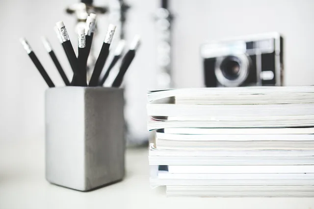 pencils, notebooks, stack, school supplies, write, blog, blogger, writer, work, work desk, monochrome, black and white, blog, blog, blog, blog, blog, writer, writer, work, work, work, work. Reporting on a creator media kit without inventing impact