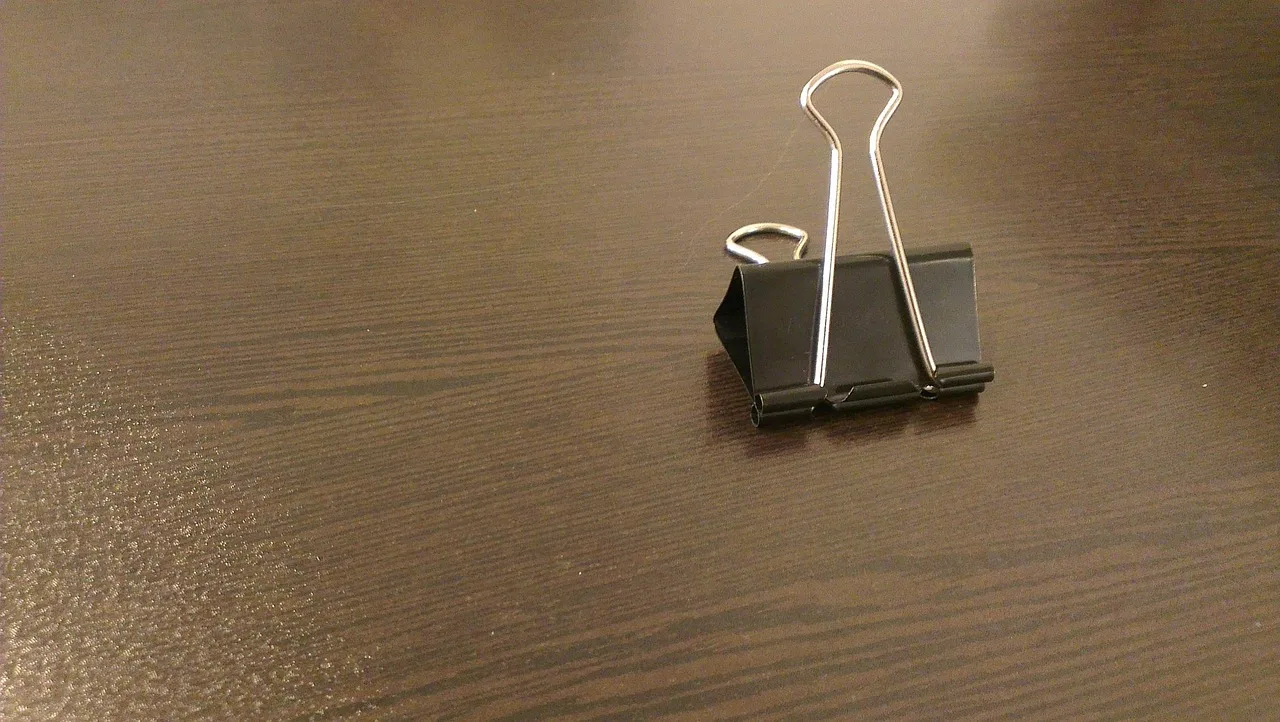 brown, desk, clip, paper clip, wood, table, wooden, brown desk, desk, desk, desk, desk, desk, clip, clip, clip, clip, clip, paper clip, paper clip, paper clip, paper clip, paper clip